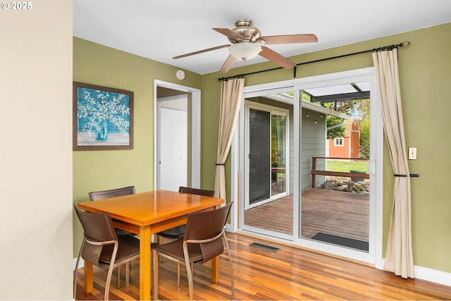 17954 NW Andria Ave, Portland, OR 97229 - dining area featuring baseboards, wood finished floors, and ceiling fan