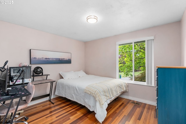 17954 NW Andria Ave, Portland, OR 97229 - bedroom with wood finished floors and baseboards
