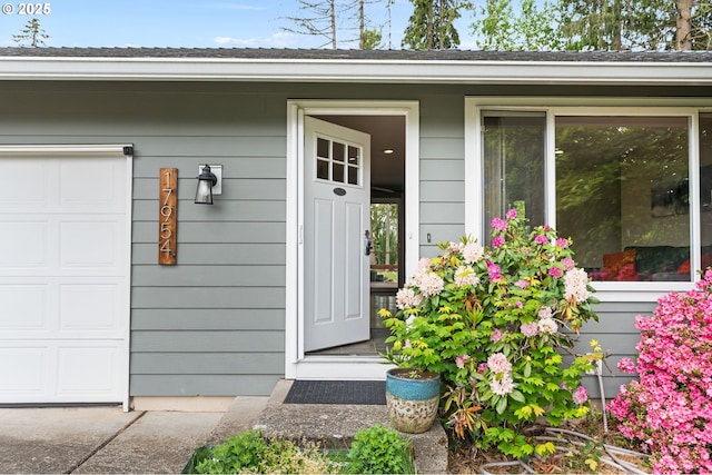 17954 NW Andria Ave, Portland, OR 97229 - view of exterior entry featuring a garage