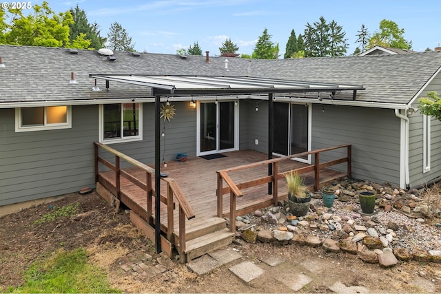 17954 NW Andria Ave, Portland, OR 97229 - back of property featuring a wooden deck and a shingled roof