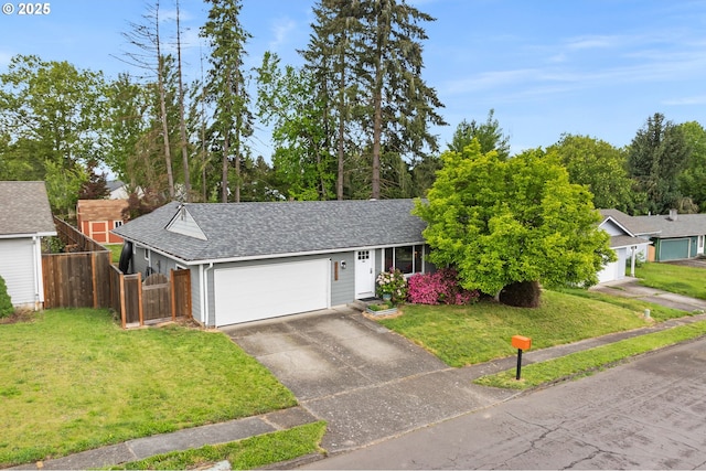 17954 NW Andria Ave, Portland, OR 97229 - view of front of home with an attached garage, a shingled roof, and asphalt driveway