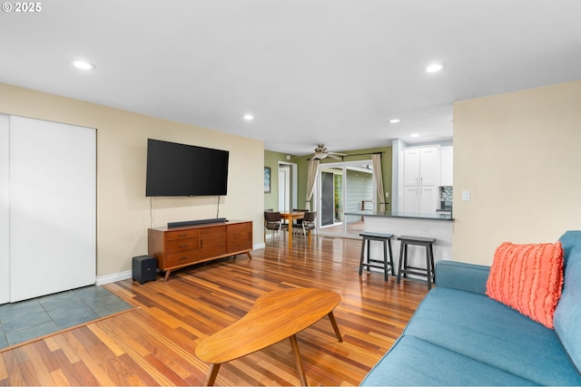 17954 NW Andria Ave, Portland, OR 97229 - living area with wood finished floors, recessed lighting, ceiling fan, and baseboards