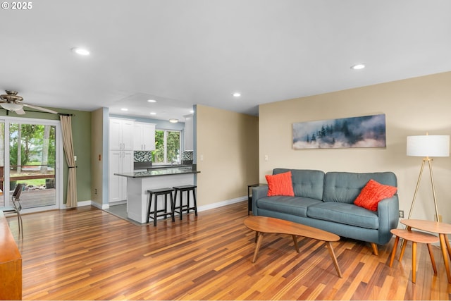 17954 NW Andria Ave, Portland, OR 97229 - living area with wood finished floors, baseboards, recessed lighting, and ceiling fan