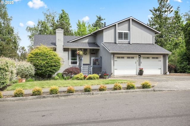767 SW 8th St, Gresham, OR 97080 - view of front of house with a chimney, an attached garage, asphalt driveway, roof with shingles, and a front lawn