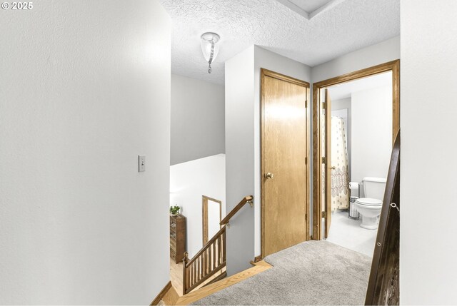 767 SW 8th St, Gresham, OR 97080 - hallway featuring an upstairs landing and a textured ceiling