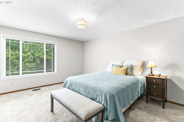 767 SW 8th St, Gresham, OR 97080 - carpeted bedroom with baseboards and a textured ceiling