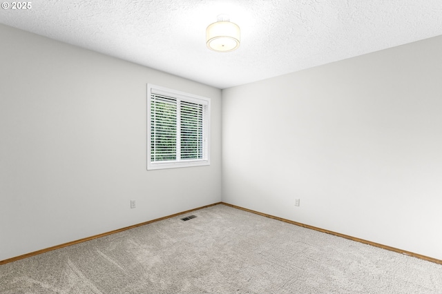 767 SW 8th St, Gresham, OR 97080 - carpeted spare room with baseboards and a textured ceiling