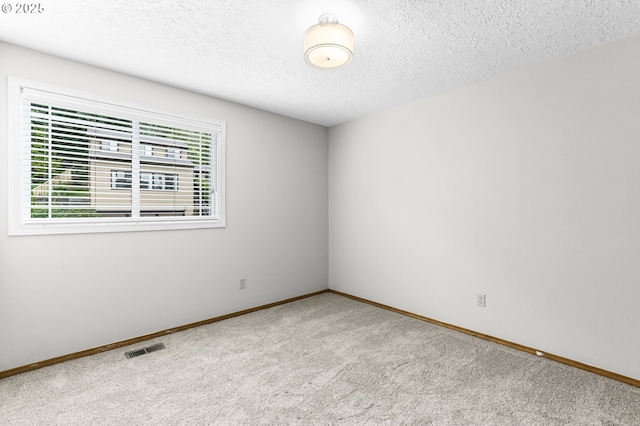 767 SW 8th St, Gresham, OR 97080 - spare room with carpet, baseboards, and a textured ceiling