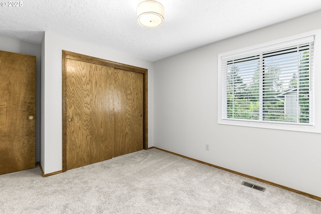 767 SW 8th St, Gresham, OR 97080 - unfurnished bedroom with a closet, carpet, and baseboards