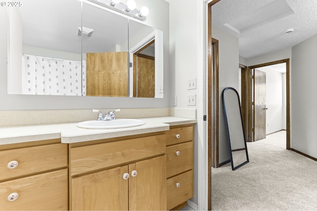 767 SW 8th St, Gresham, OR 97080 - full bathroom with vanity, a textured ceiling, a shower with curtain, and baseboards