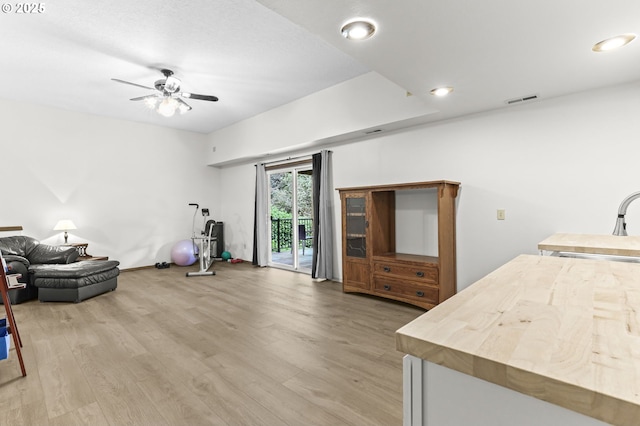 767 SW 8th St, Gresham, OR 97080 - workout room with light wood finished floors, ceiling fan, a sink, recessed lighting, and baseboards