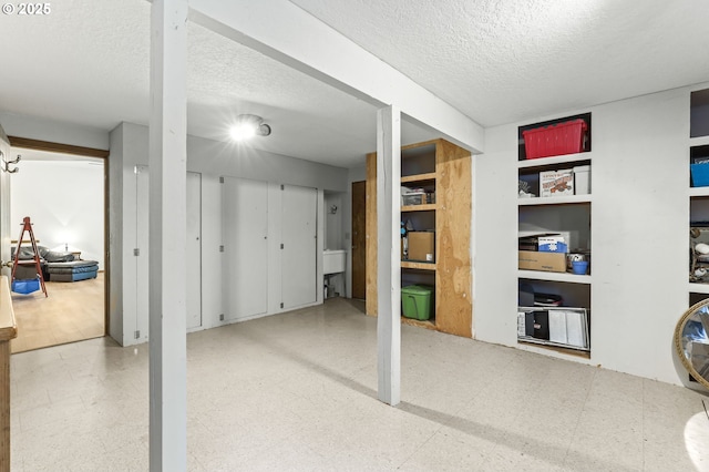 767 SW 8th St, Gresham, OR 97080 - finished basement featuring tile patterned floors and a textured ceiling