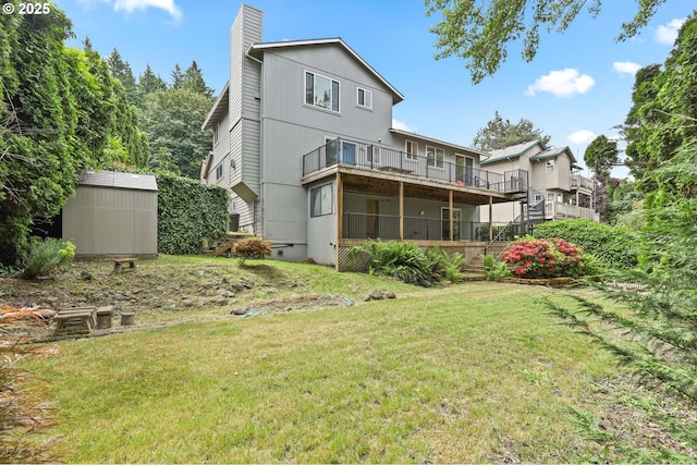 767 SW 8th St, Gresham, OR 97080 - back of property with a yard, a chimney, stairs, and a wooden deck