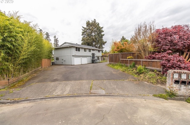 12190 SW Merestone Ct, Tigard, OR 97223 - view of front of home featuring a garage