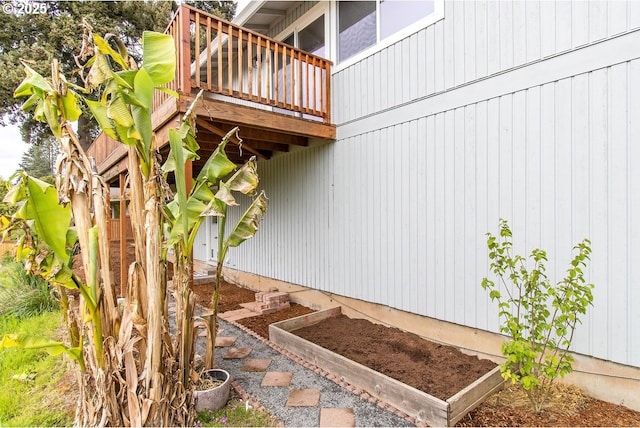 12190 SW Merestone Ct, Tigard, OR 97223 - view of property exterior featuring a garden and a deck