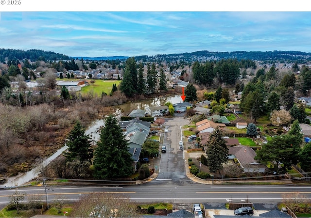 12190 SW Merestone Ct, Tigard, OR 97223 - aerial perspective of suburban area with a mountainous background
