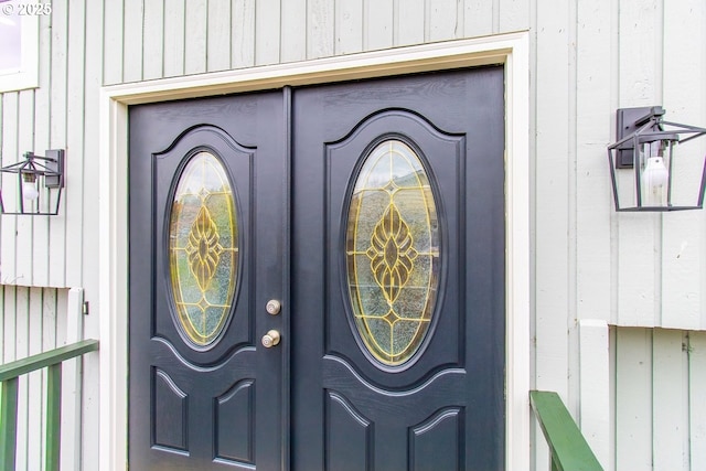 12190 SW Merestone Ct, Tigard, OR 97223 - view of exterior entry featuring board and batten siding