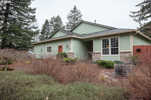 view of front of property with brick siding