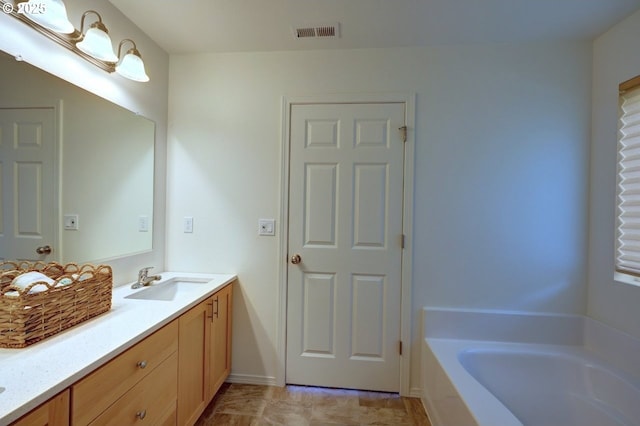 89650 Sea Breeze Dr, Warrenton, OR 97146 - full bathroom with a tub to relax in and vanity