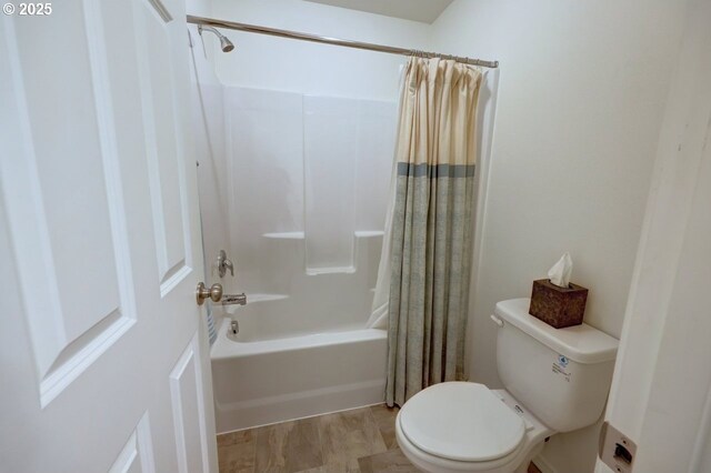 89650 Sea Breeze Dr, Warrenton, OR 97146 - bathroom featuring toilet and shower / tub combo with curtain