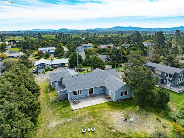 89650 Sea Breeze Dr, Warrenton, OR 97146 - aerial view of property and surrounding area with mountains