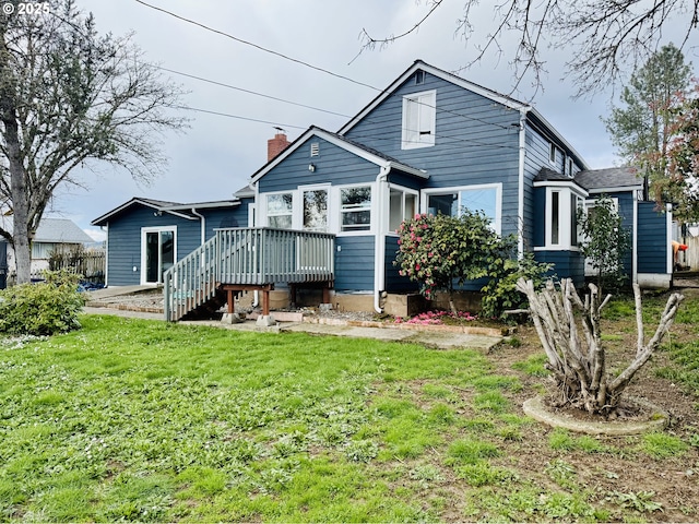 551 NW T St, Winston, OR 97496 - rear view of property with a yard, a deck, and a chimney