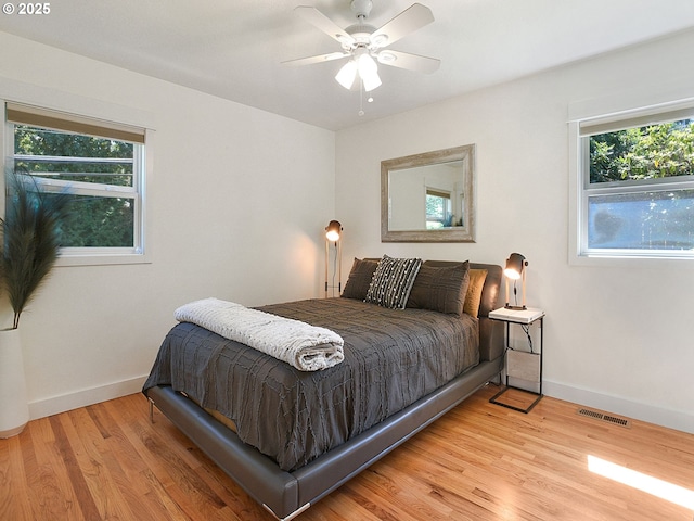 1720 Kilkenny Dr, Lake Oswego, OR 97034 - bedroom with light wood-style floors and ceiling fan