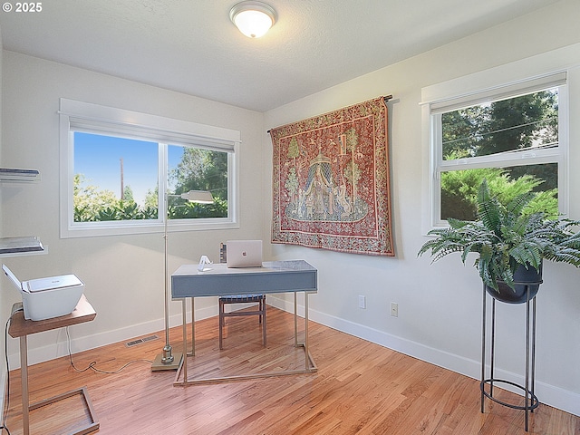 1720 Kilkenny Dr, Lake Oswego, OR 97034 - office area with healthy amount of natural light and light wood-style floors