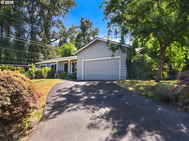 1720 Kilkenny Dr, Lake Oswego, OR 97034 - ranch-style home with asphalt driveway, a garage, and a front lawn