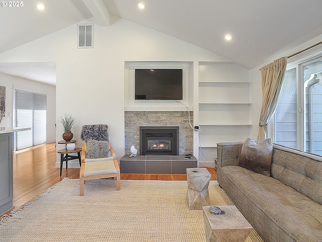 1720 Kilkenny Dr, Lake Oswego, OR 97034 - living room with vaulted ceiling, wood finished floors, a fireplace, recessed lighting, and built in shelves