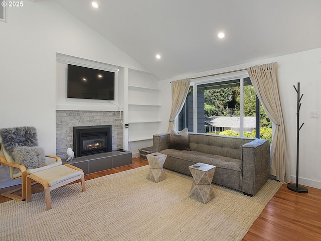 1720 Kilkenny Dr, Lake Oswego, OR 97034 - living room with recessed lighting, wood finished floors, a fireplace, built in shelves, and high vaulted ceiling