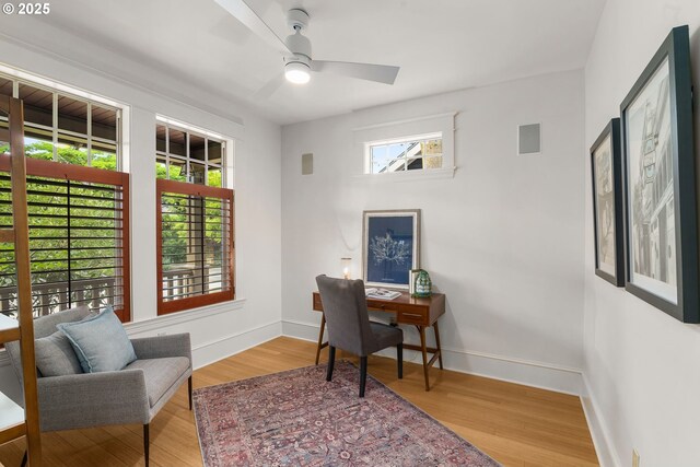 1620 NE Going St, Portland, OR 97211 - home office with healthy amount of natural light, ceiling fan, and wood finished floors