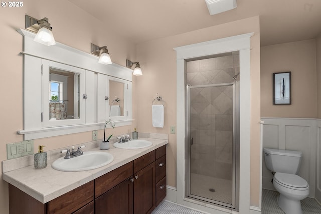 1620 NE Going St, Portland, OR 97211 - full bath featuring double vanity, a stall shower, and tile patterned flooring