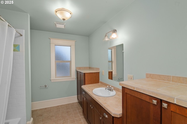 1620 NE Going St, Portland, OR 97211 - full bath featuring vanity and shower / tub combo with curtain