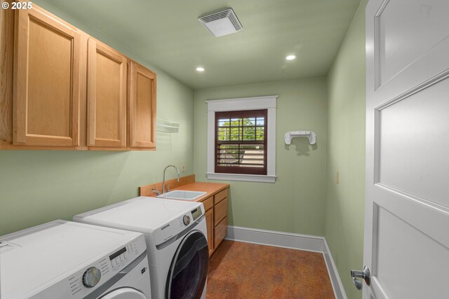 1620 NE Going St, Portland, OR 97211 - laundry area featuring washing machine and clothes dryer, cabinet space, and recessed lighting