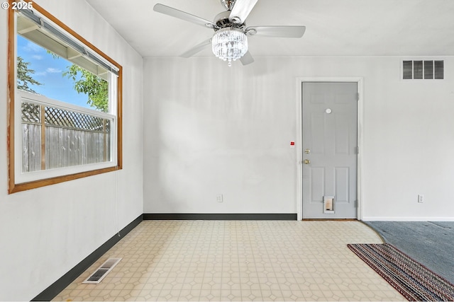 12130 SE Reedway St, Portland, OR 97266 - unfurnished room with ceiling fan and tile patterned floors