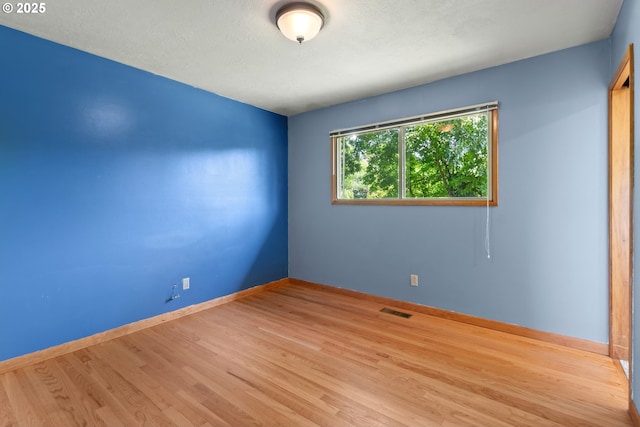 3602 NE 134th Ave, Portland, OR 97230 - spare room with wood finished floors and baseboards