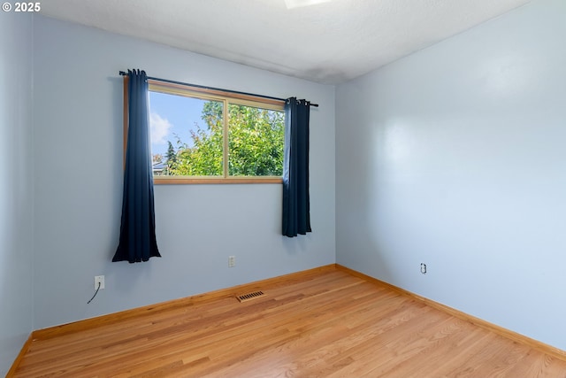 3602 NE 134th Ave, Portland, OR 97230 - empty room with wood finished floors and baseboards