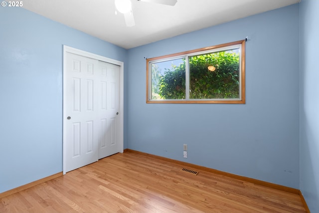3602 NE 134th Ave, Portland, OR 97230 - unfurnished bedroom with light wood-style flooring, a closet, and ceiling fan