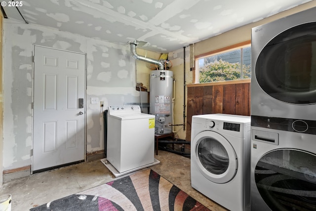 3602 NE 134th Ave, Portland, OR 97230 - washroom with water heater and stacked washer and clothes dryer