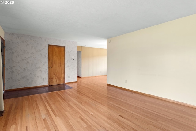 3602 NE 134th Ave, Portland, OR 97230 - empty room with wood finished floors and baseboards