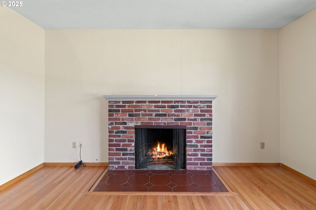 3602 NE 134th Ave, Portland, OR 97230 - detailed view of wood finished floors and a brick fireplace