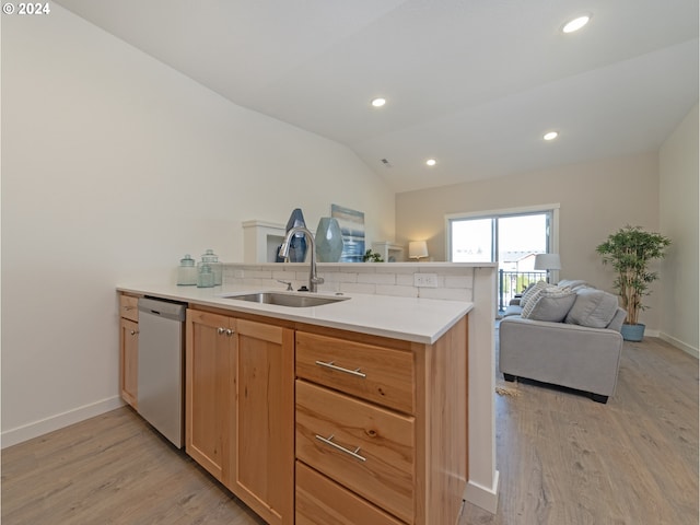 2366 Kingwood St, Forest Grove, OR 97116 - kitchen featuring open floor plan, vaulted ceiling, a sink, dishwasher, and a peninsula