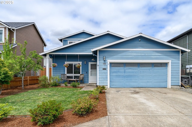 976 E 15th St, Lafayette, OR 97127 - view of front of property featuring a porch, a garage, and driveway