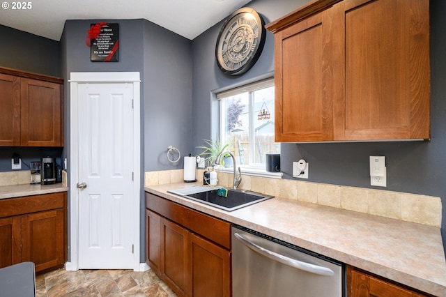 976 E 15th St, Lafayette, OR 97127 - kitchen with dishwasher, light countertops, and brown cabinets