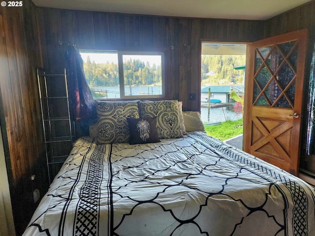 3062 S Tenmile, Lakeside, OR 97449 - bedroom featuring wooden walls and access to exterior