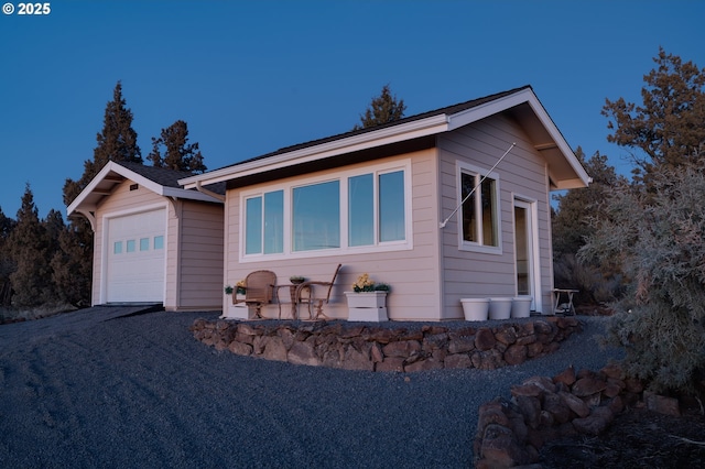 ranch-style house featuring a garage