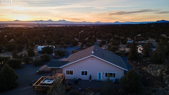 aerial view at dusk with a mountain view