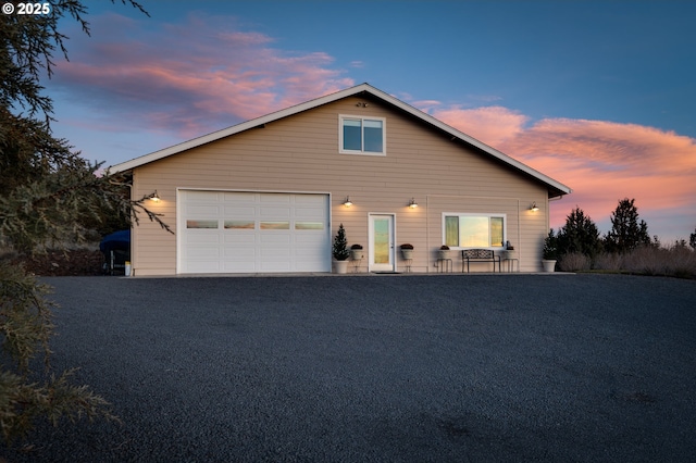 view of front of property with a garage