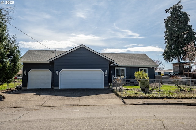 ranch-style home featuring fence, roof with shingles, an attached garage, and concrete driveway